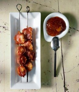 Prosciutto shrimp skewers with mango sauce