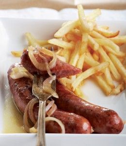 Beer-braised pork sausages with mustard and onions