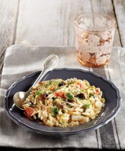 Orzo risotto with fresh tomato, leek and prunes