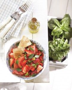 Tomato salad with peppers, strawberries, sumac and basil