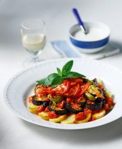 Roast vegetables with tomato sauce and yogurt – tahini dressing