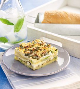 Omelet cake with courgette, potatoes and fresh herbs
