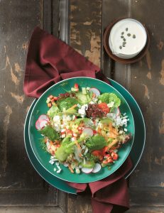 Lola rosa, rocket, cabbage and herb salad with yogurt dressing