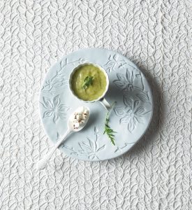 Smooth rocket and zucchini soup with Graviera cheese