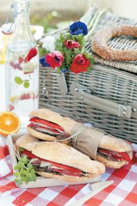Salami, pepper and garlicky olive paste sandwich