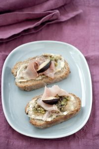 Prune and prosciutto bruschettas