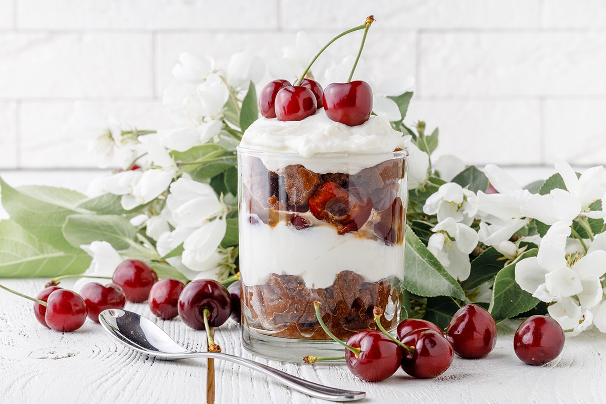 Delicius trifle with cherry and cream for breakfast