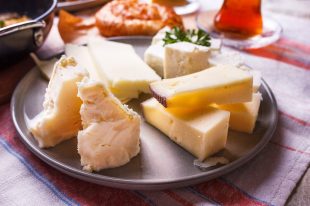 Traditional white feta cheese on plate for turkish breakfast