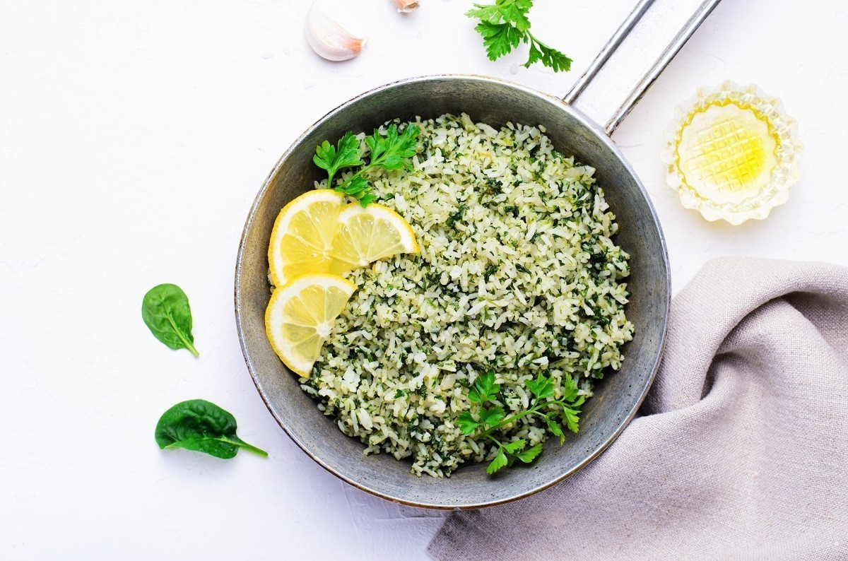 Spinach Rice in a Skillet over White Background