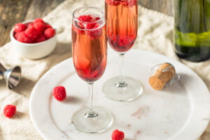Refreshing,Alcoholic,Kir,Royale,With,Champagne,Raspberries
