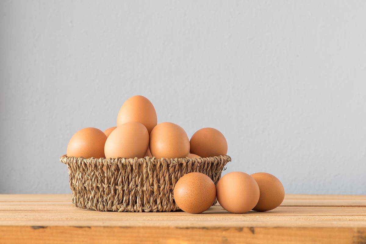 Egg,In,A,Basket,On,Wooden,Table,,chicken,Egg