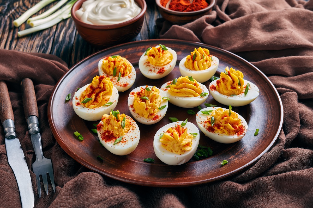 Close-up,Of,Deviled,Eggs,Sprinkled,With,Paprika,And,Finely,Chopped