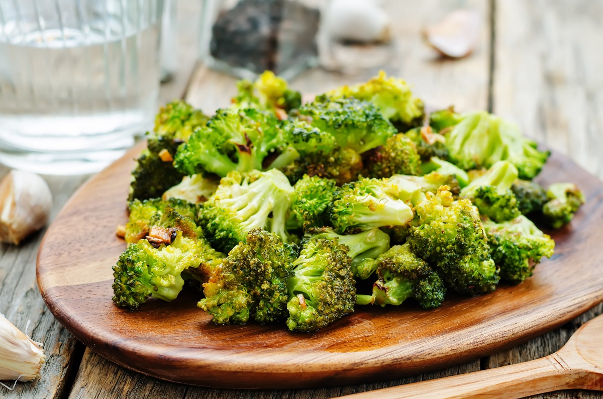 Roasted,Broccoli,With,Garlic,On,A,Dark,Wood,Background.,The