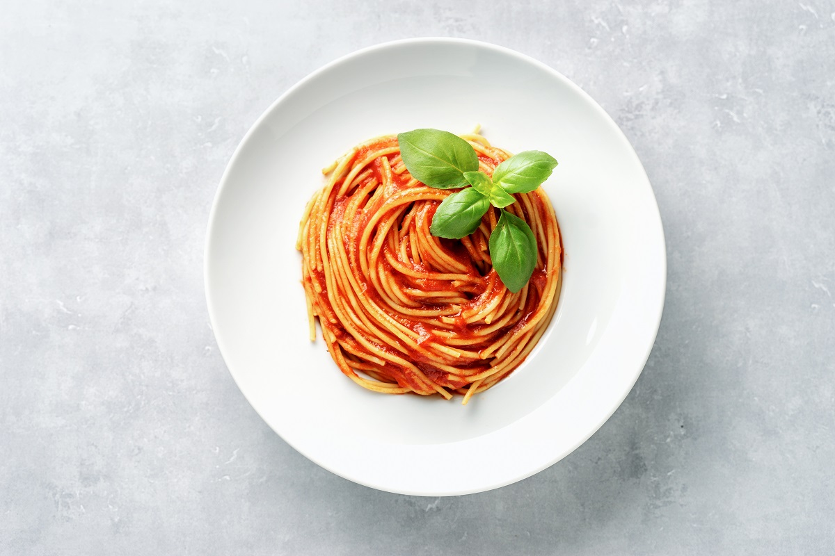 Top,View,Of,Plate,With,Spaghetti,In,Tomato,Sauce,And