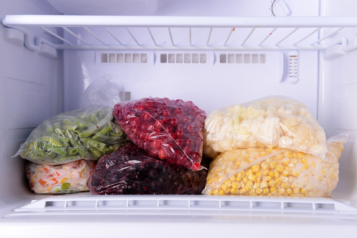 Frozen,Berries,And,Vegetables,In,Bags,In,Freezer,Close,Up