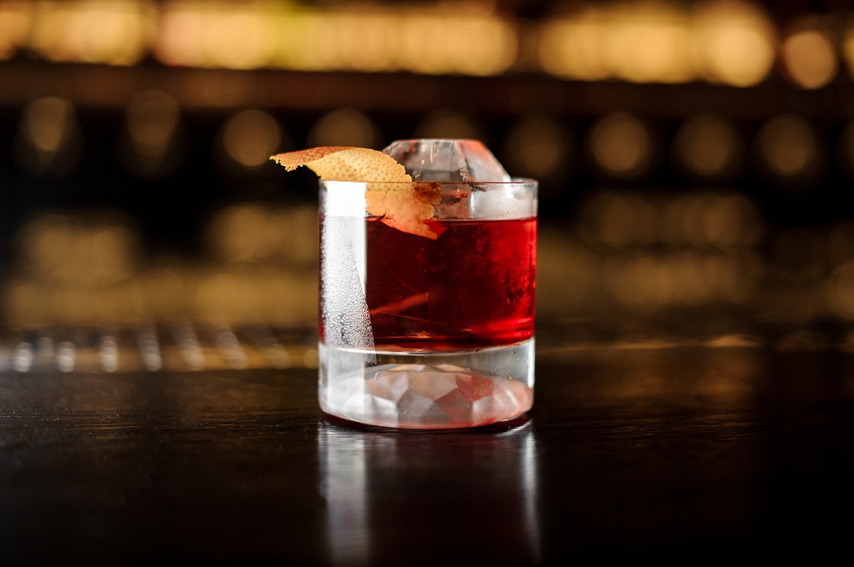 Glass,Of,A,Boulevardier,Cocktail,With,Big,Ice,Cube,And