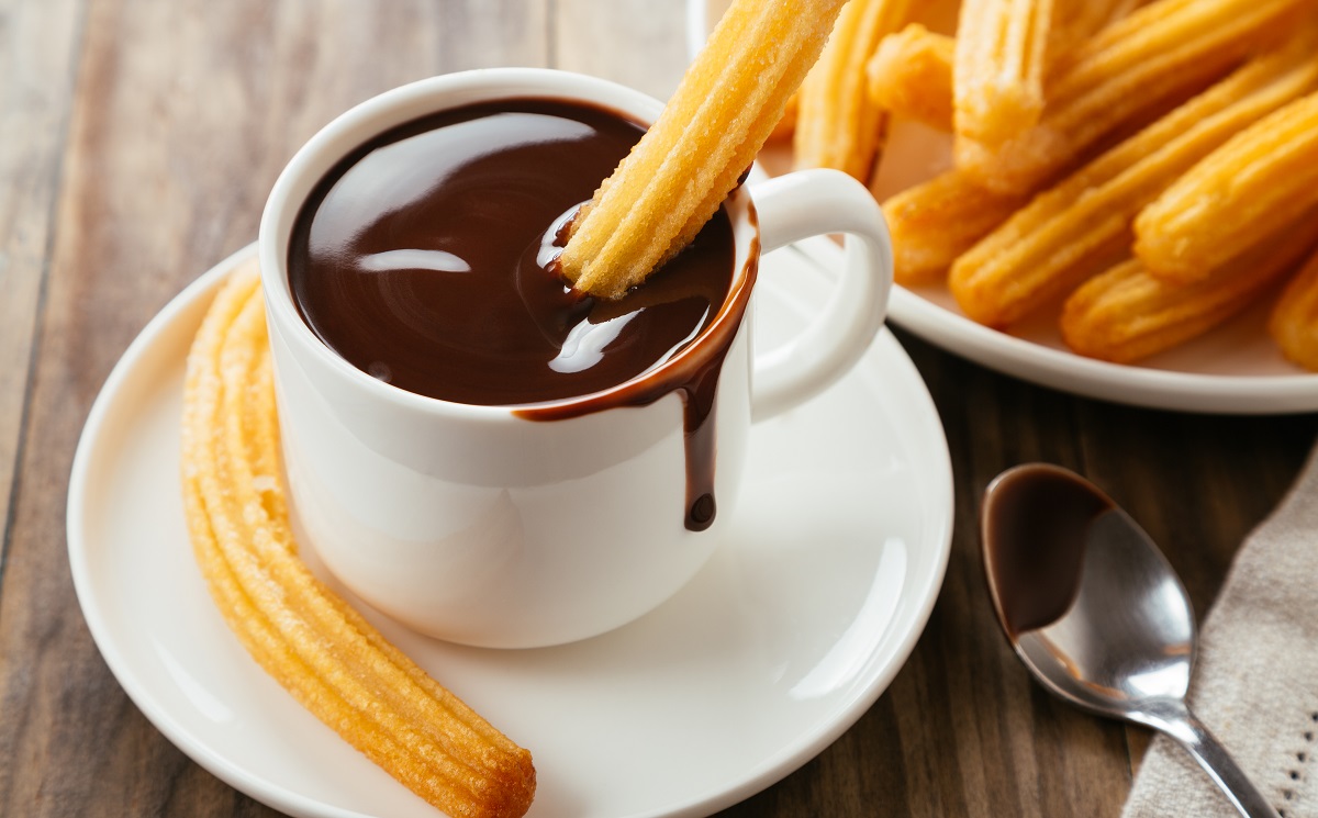 Traditional,Spanish,Churros,With,Hot,Chocolate,Sauce,On,A,Rustic