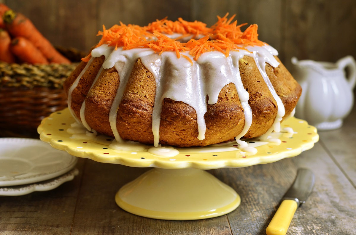 Carrot,Cake,With,Sugar,Glaze,On,Rustic,Background.