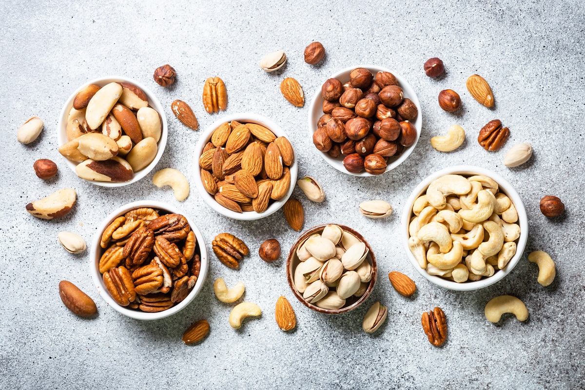 Assortment,Of,Nuts,In,Bowls.,Cashew,,Hazelnuts,,Pecan,,Almonds,,Brazilian