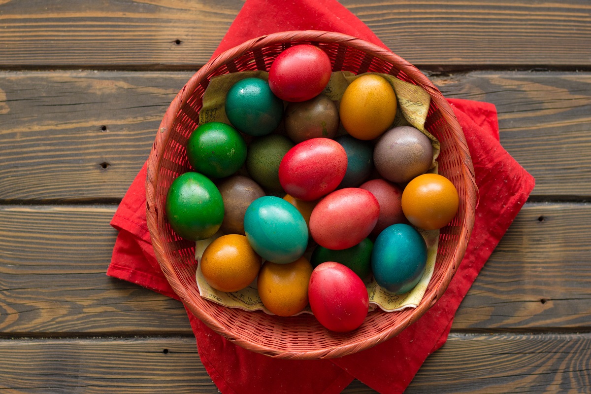 Top,View,Of,Easter,Colored,Eggs,In,A,Red,Wicker