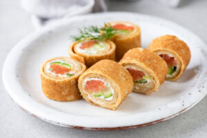 Crepe,Salmon,Rolls,With,Herbed,Cream,Cheese.,Appetizer,Party,Food