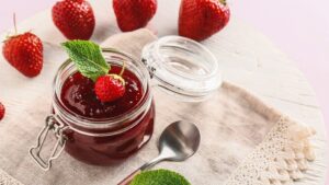 Jar,Of,Tasty,Strawberry,Jam,On,Table,,Closeup