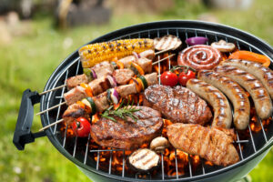 Assorted,Delicious,Grilled,Meat,With,Vegetables,Over,The,Coals,On