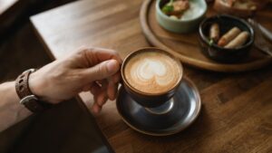 A,Close-up,Shot,Of,A,Cappuccino,Cup,With,A,Heart-shaped