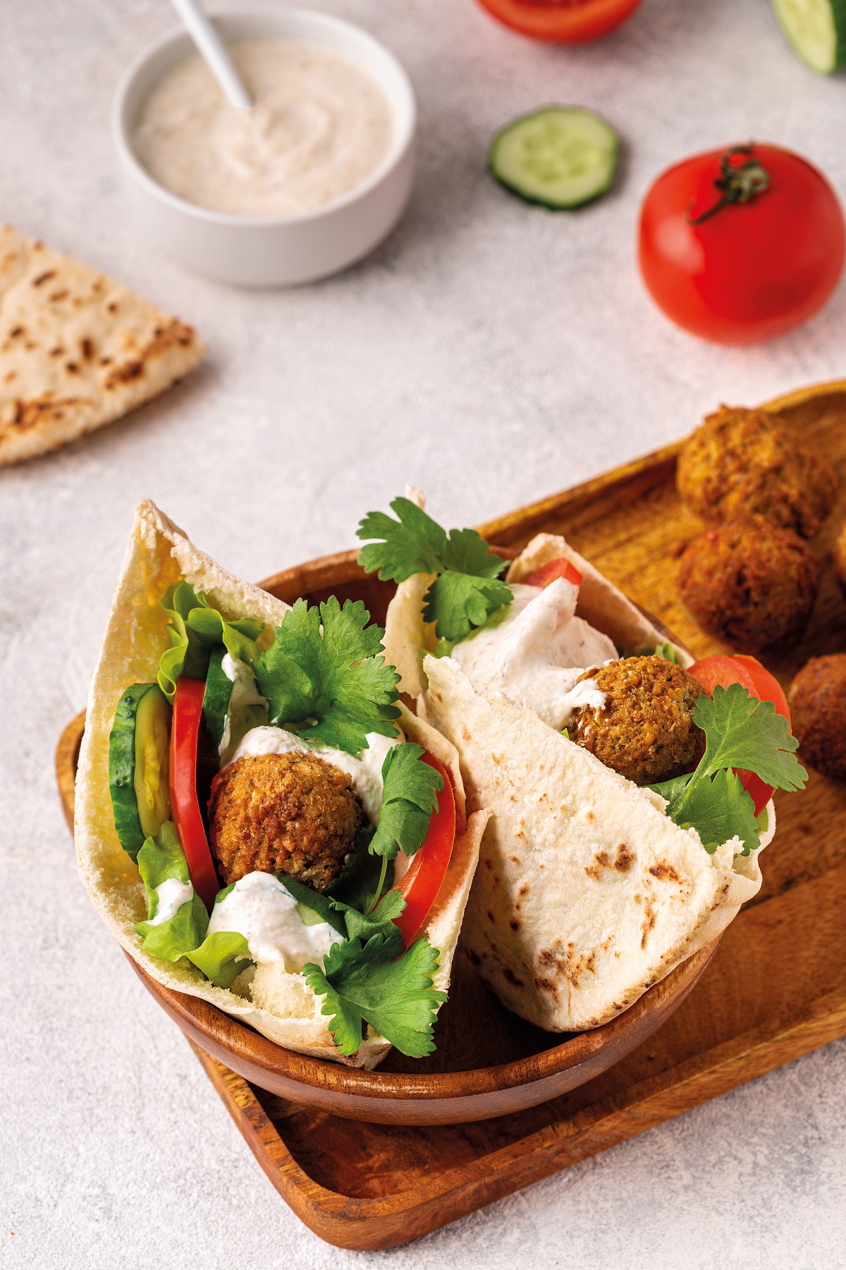 Falafel and fresh vegetables in pita bread