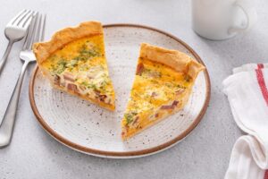 Two,Slices,Of,Ham,And,Cheese,Quiche,,Recipe,For,Easter