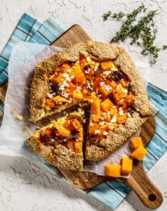 Pumpkin,Galette,With,Caramelized,Onion,,Cream,Cheese,,Thyme,And,Crumbled