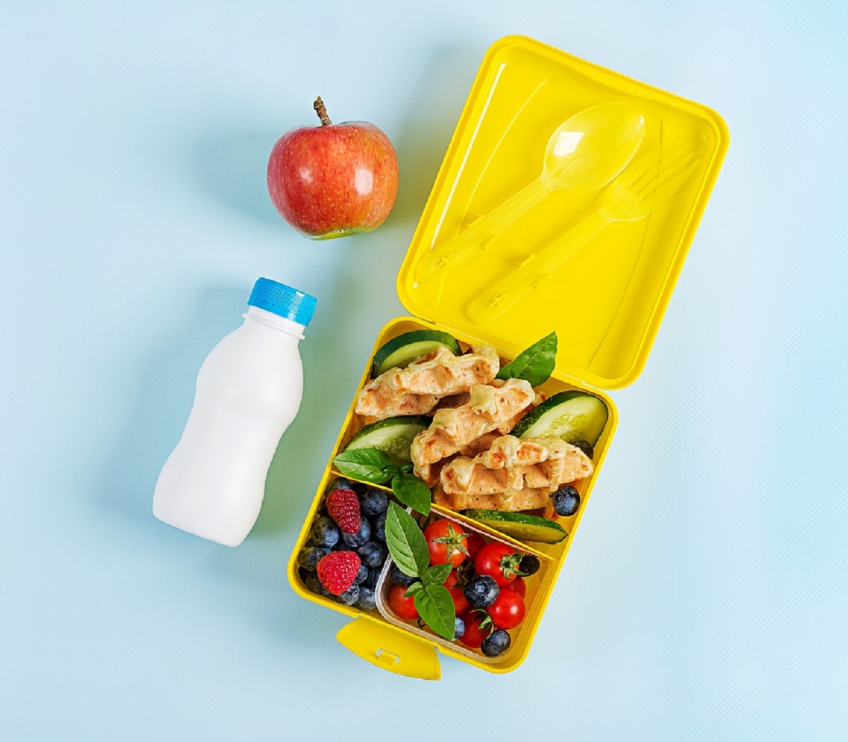 Kids,Lunch,Box,With,Zucchini,Waffles,,Cucumber,,Cherry,Tomatoes,And