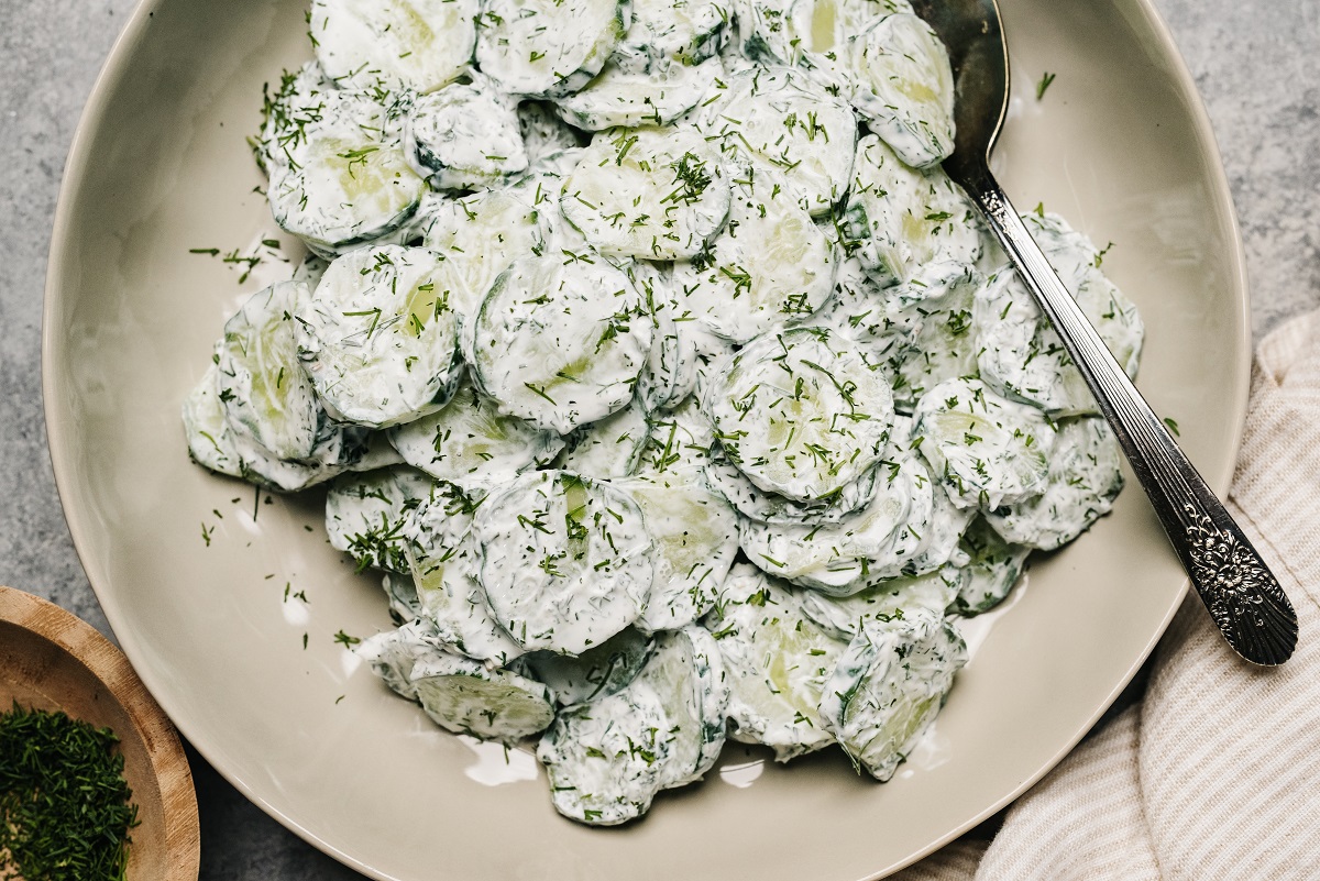 Creamy,Cucumber,Salad,With,Dill,In,A,Bowl