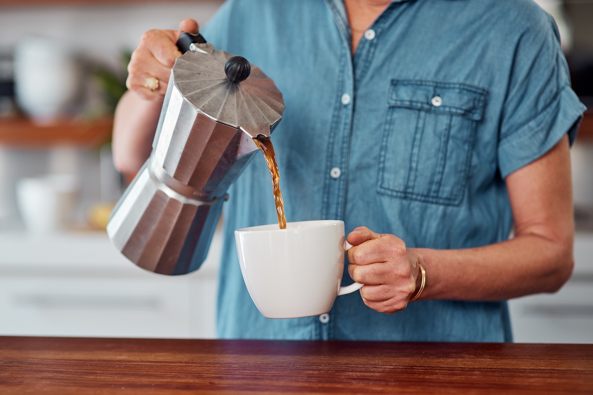 Woman,,Hands,And,Coffee,With,Moka,Pot,For,Morning,,Caffeine