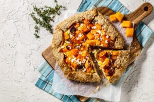 Pumpkin,Galette,With,Caramelized,Onion,,Cream,Cheese,,Thyme,And,Crumbled