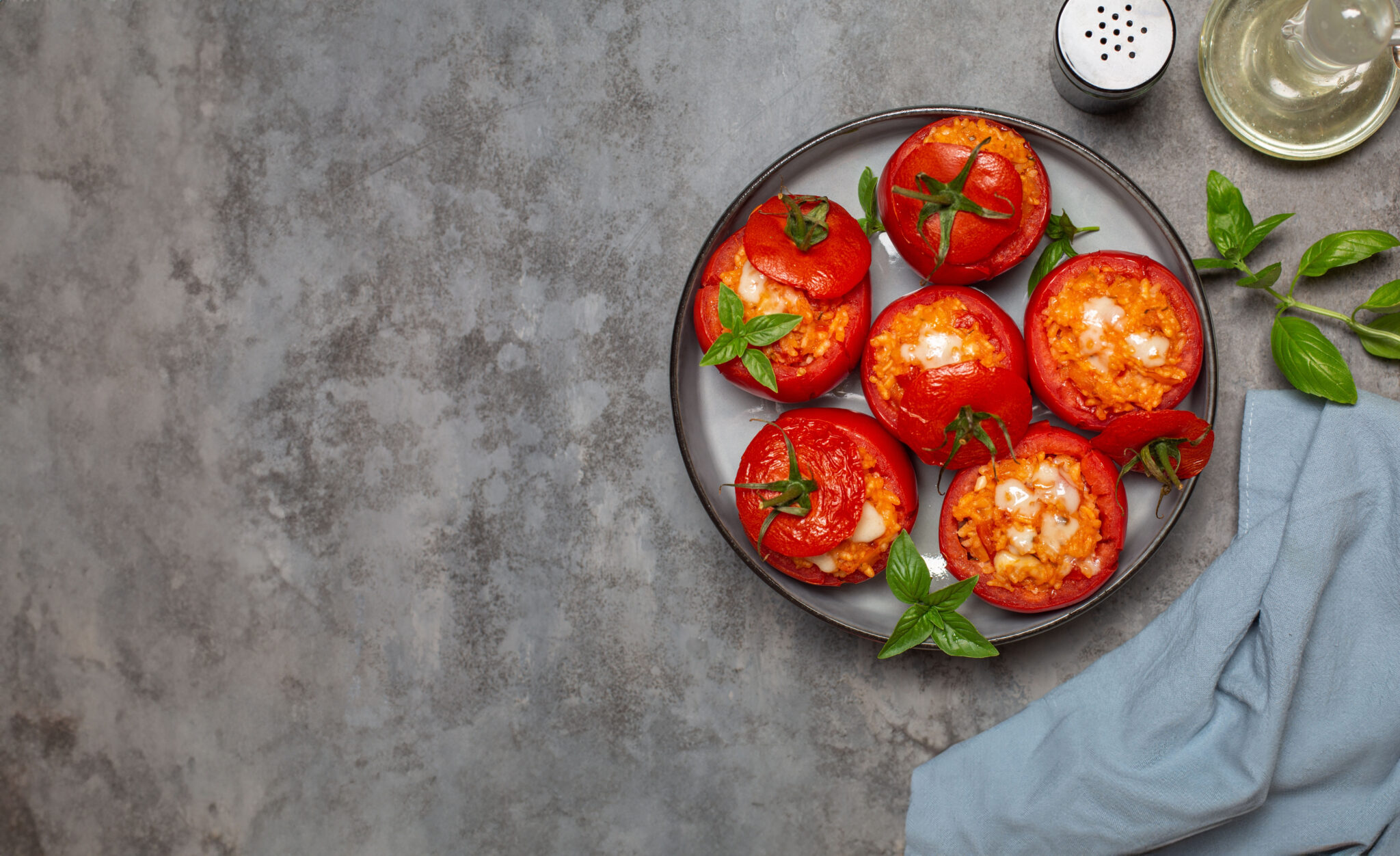 Baked,Stuffed,Tomatoes,With,Rice,And,Cheese.,Top,View.,Grey