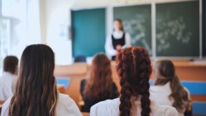 Students,Girls,Sitting,In,A,Class,At,School.