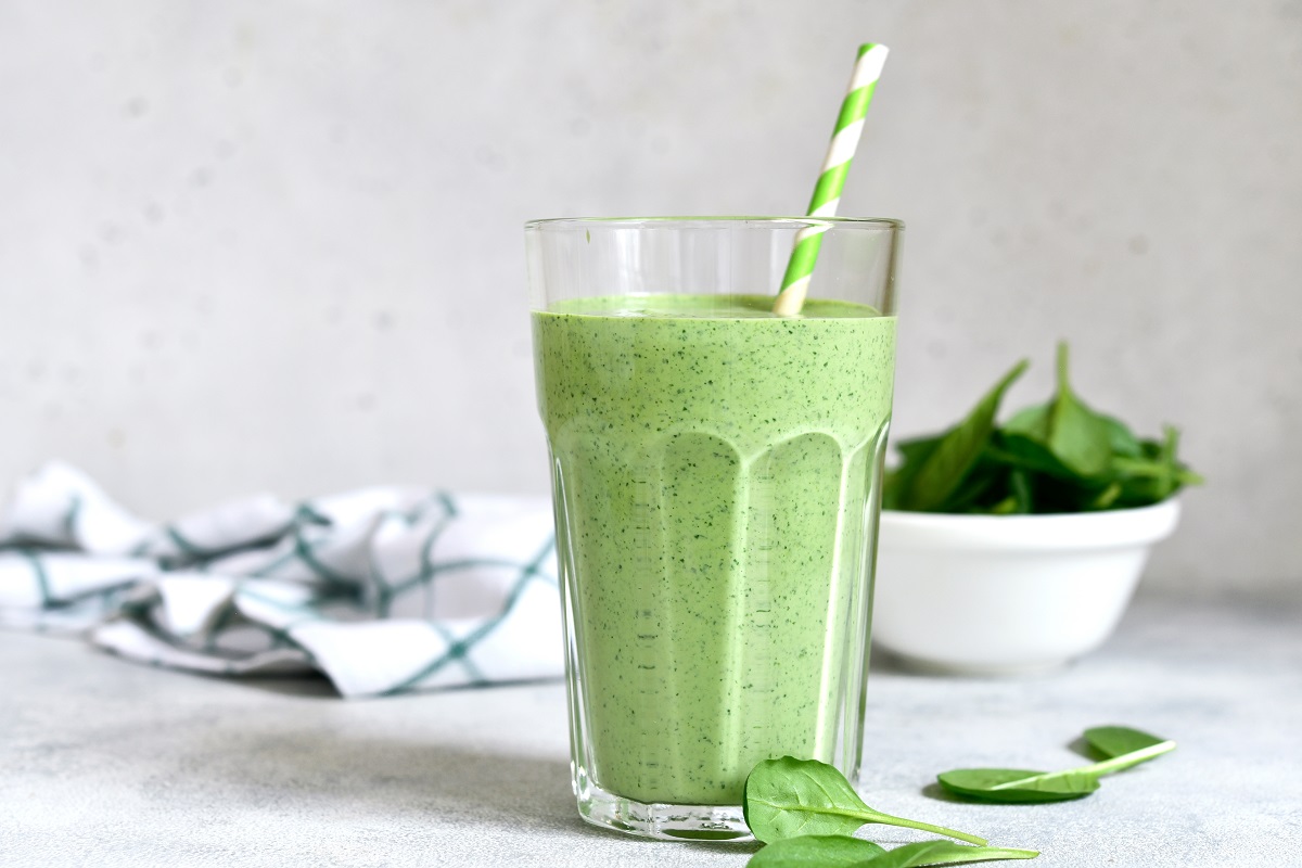 Detox,Spinach,Smoothie,In,A,Tall,Glass,On,White,Slate,