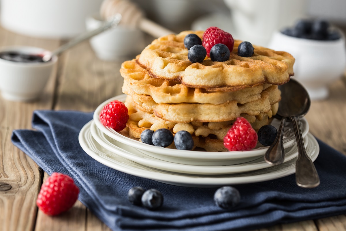 Blueberry,Waffles,With,Raspberries,For,Breakfast