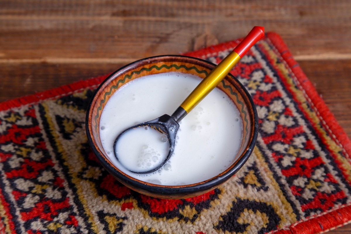 Camel,Milk,Shubat,On,A,Wooden,Background