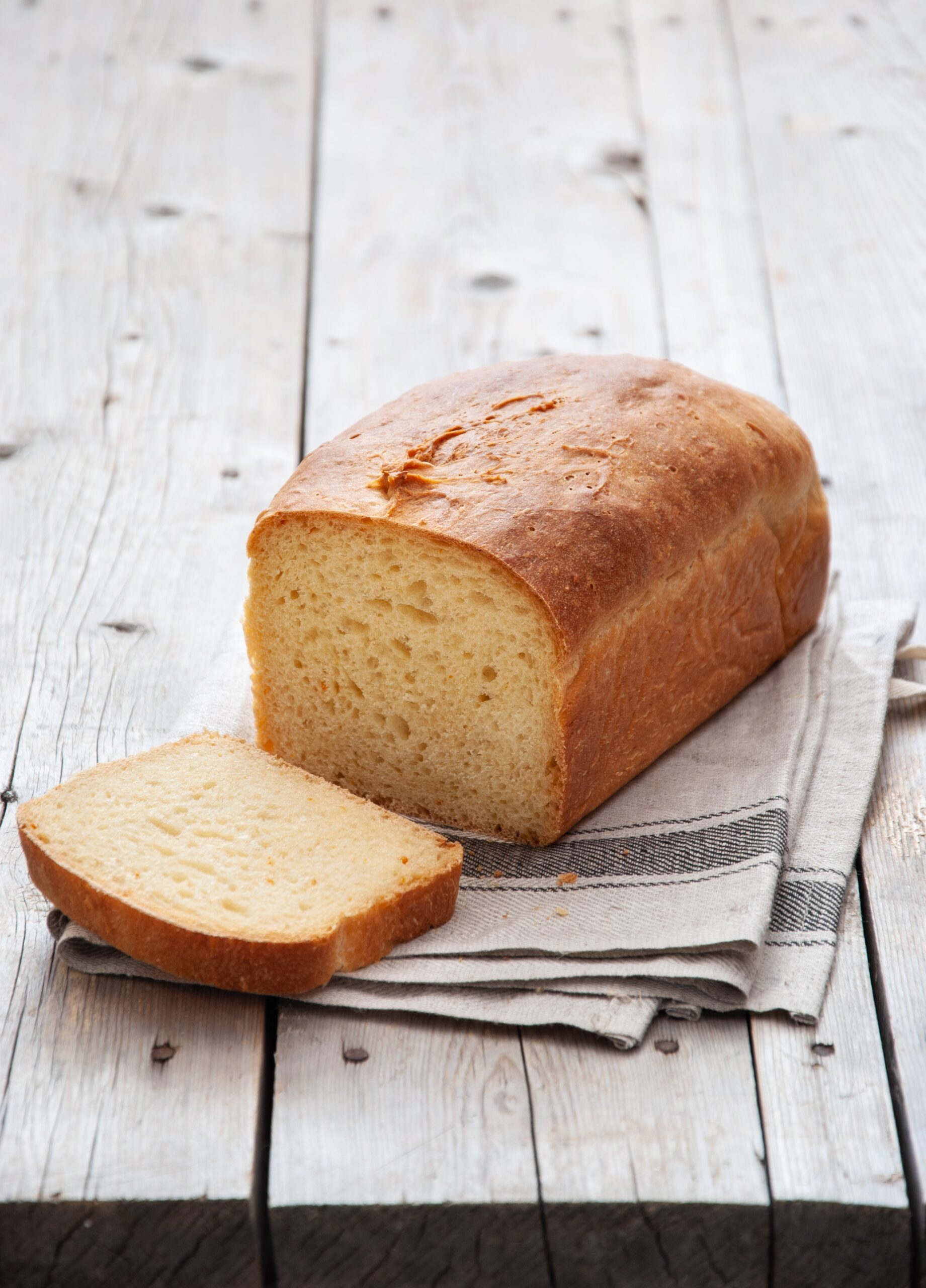 Homemade,Sweet,Bread,On,Gray,Wooden,Background