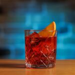 Cocktail,Allure:,Classic,Negroni,Cocktail,On,A,Bar,Table,With