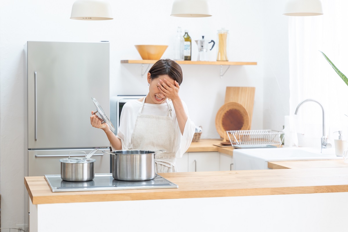 Asian,Woman,Cooking,In,The,Kitchen