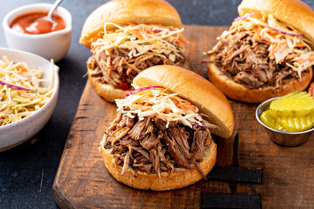 Pulled,Pork,Sandwiches,With,Cole,Slaw,And,Bbq,Sauce,On