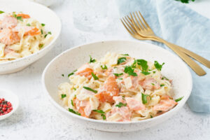 Salmon,Pasta,,Tagliatelle,With,Fish,And,Creamy,Sauce.,Italian,Dinner