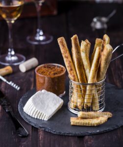 Cheesy,Breadsticks,With,Chili,And,Thyme,In,A,Basket