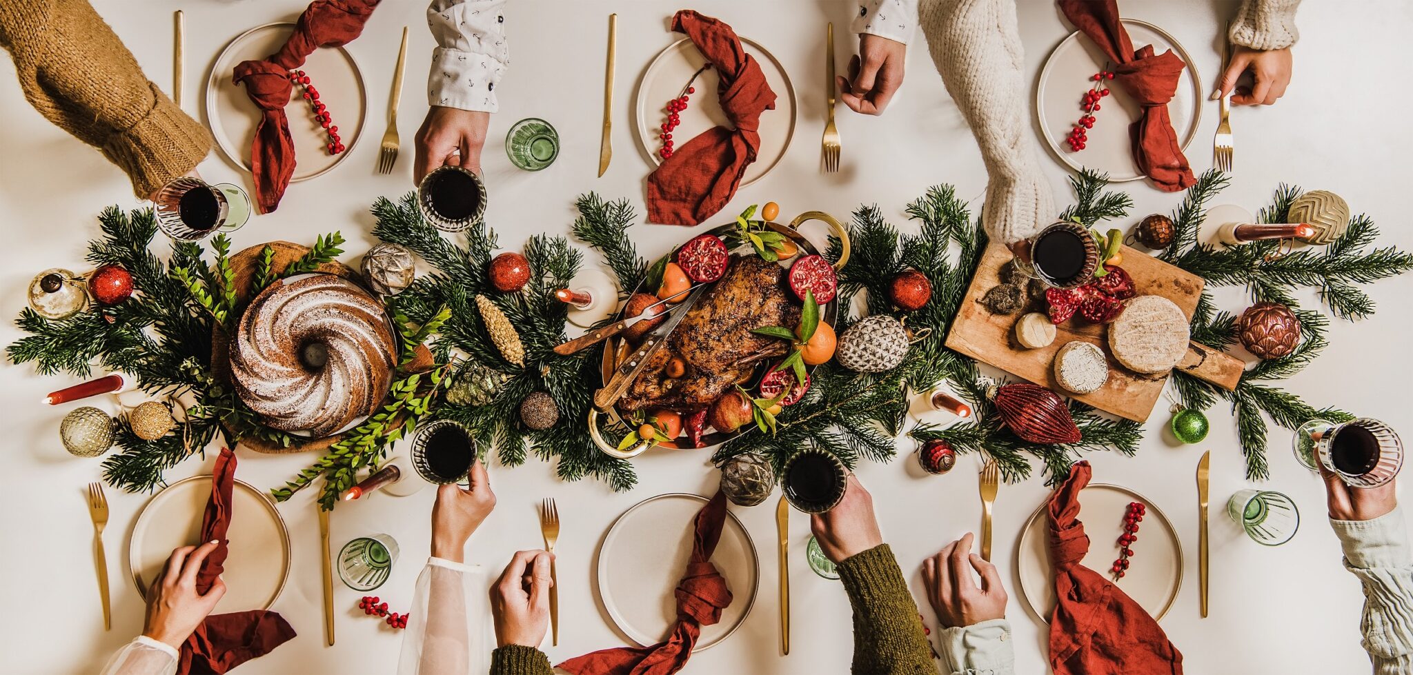 Flat-lay,Of,Festive,Christmas,Table,Setting,And,Celebrating,People