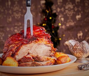 Christmas,Pork,Shoulder,Joint,With,Roast,Potatoes.