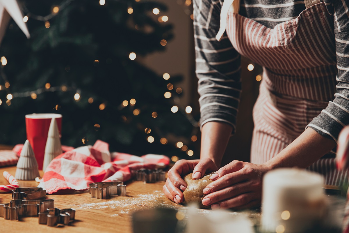 Merry,Christmas,,Happy,New,Year.,Woman,Is,Cooking,Gingerbread,Cookies