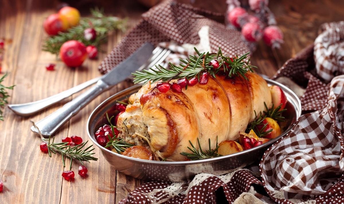 Stuffed,Turkey,Breast,With,Baked,Vegetables,And,Spices,Against,Holiday